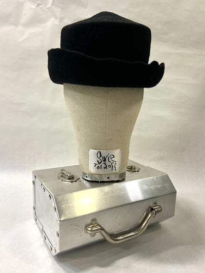 Brimmed pointed pork pie hat