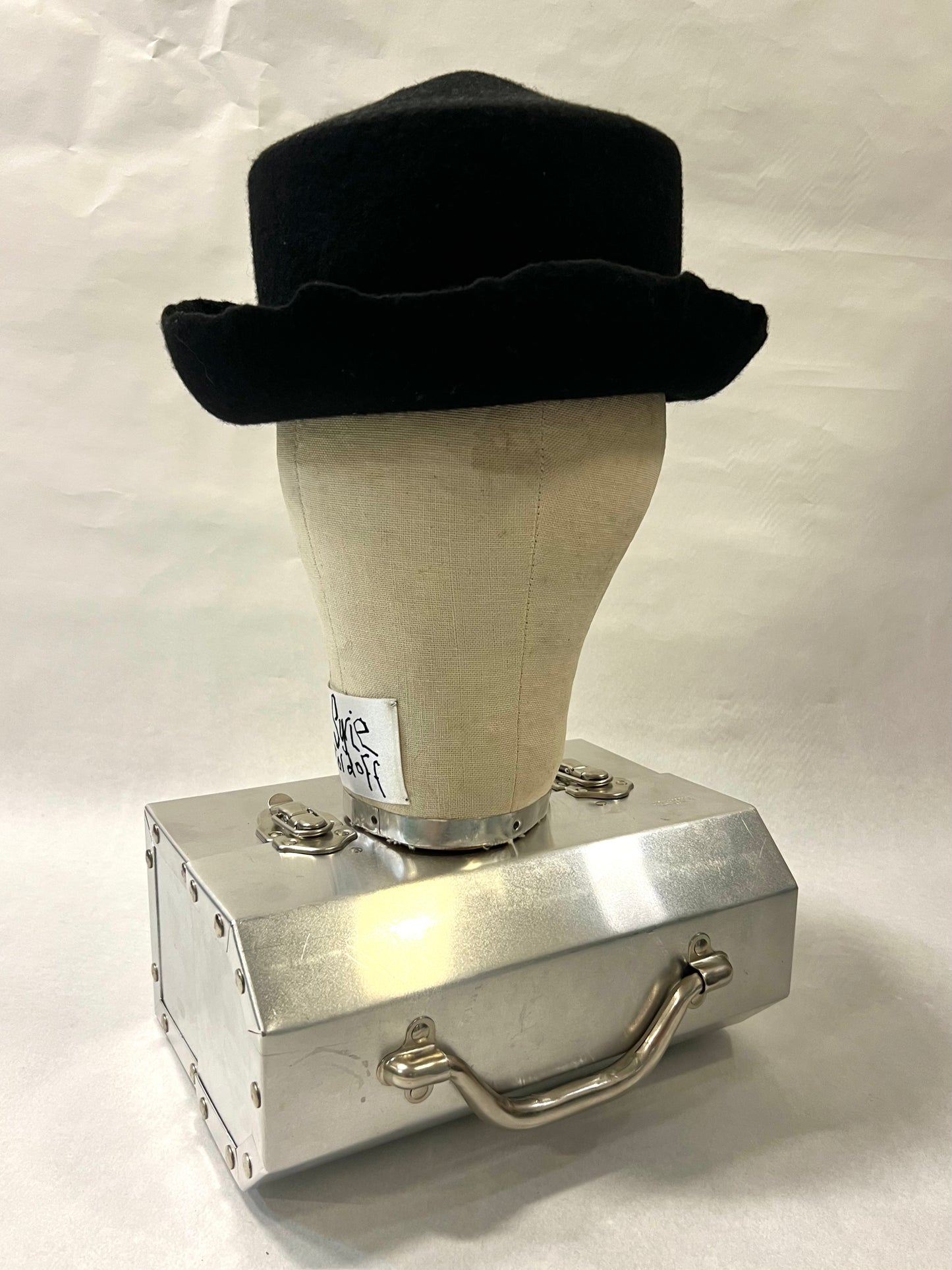 Brimmed pointed pork pie hat