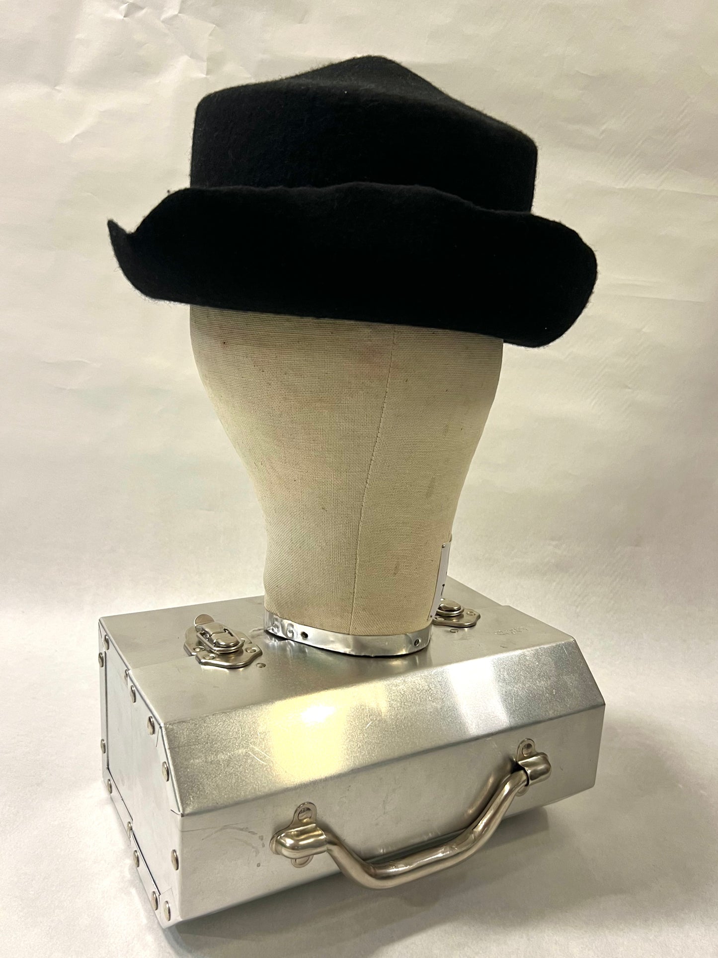Brimmed pointed pork pie hat